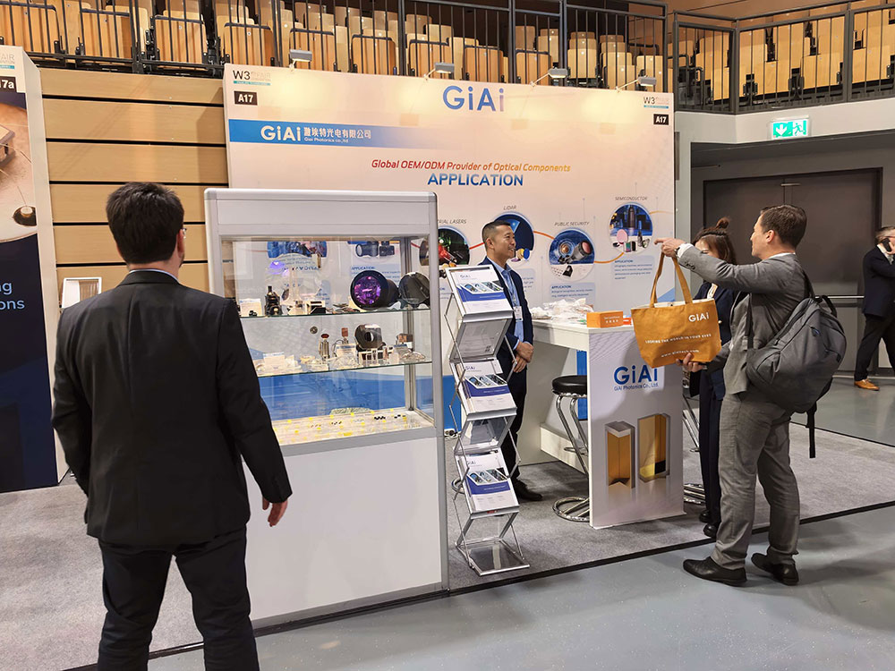 GIAI Photonics staff interacting with customers
