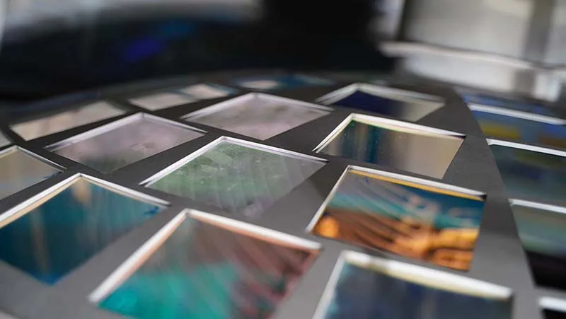 Coated optical glass components