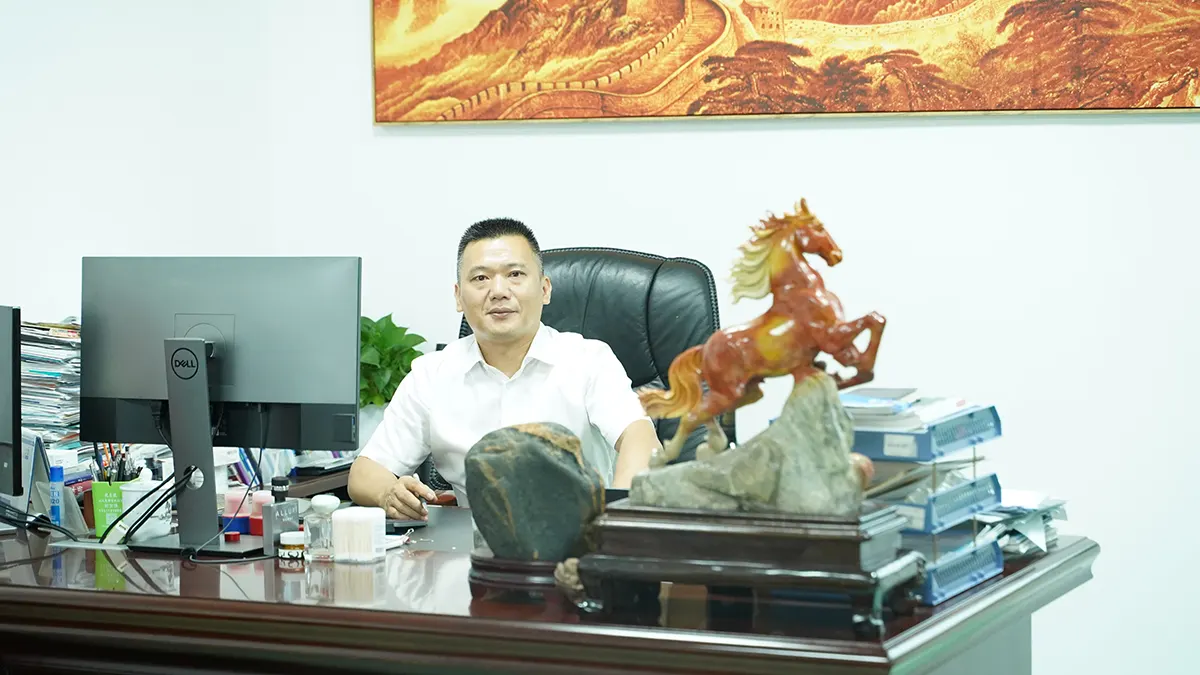 Lin, General Manager of GIAI Photonics, in his office