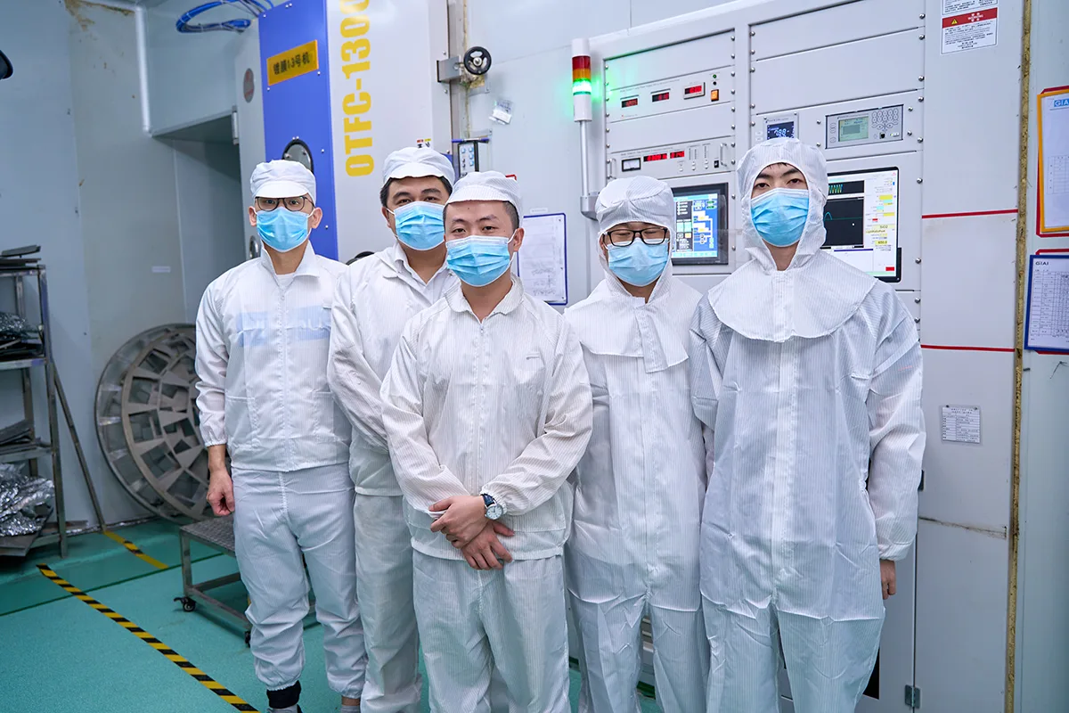 GIAI Photonics production team working in the optical manufacturing environment
