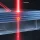 laser beam interacting with a multilayer optical coating showing a localized defect related to laser damage threshold